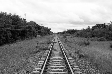 View of the railway tracks that stretched out In Thailand, black and white background