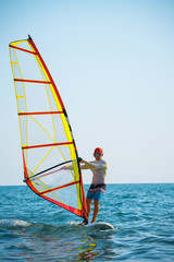 windsurfer at the sea. board. man.