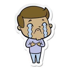 Obraz premium sticker of a cartoon man crying