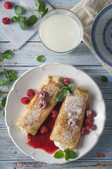 Cheese blintzes pancakes with fresh fruit