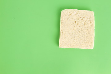 bread without rind in colorful background..