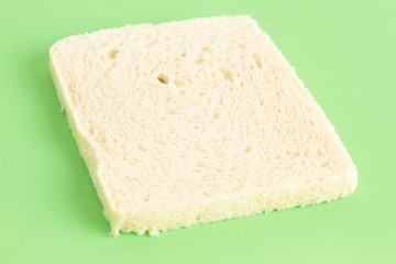 bread without rind in colorful background..