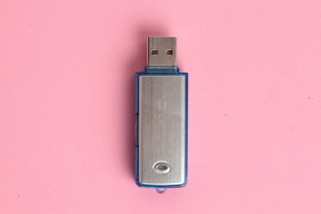Side view of silver USB memory stick  on white