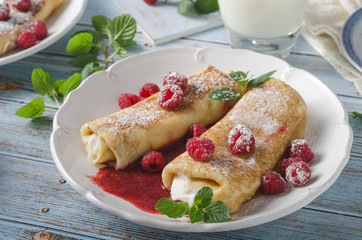 Cheese blintzes pancakes with fresh fruit