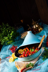 Tasty spicy beef with various vegetables cooked in tagine