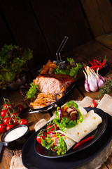 Tasty wraps filled with pulled pork and salad