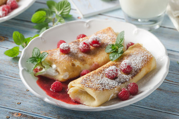 Cheese blintzes pancakes with fresh fruit