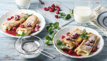 Cheese blintzes pancakes with fresh fruit