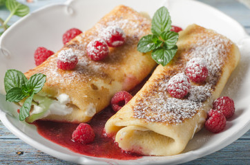 Cheese blintzes pancakes with fresh fruit
