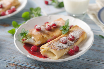 Cheese blintzes pancakes with fresh fruit