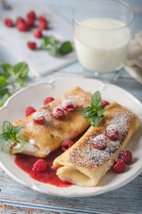 Cheese blintzes pancakes with fresh fruit