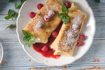 Cheese blintzes pancakes with fresh fruit