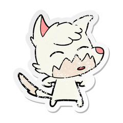 distressed sticker of a cartoon fox