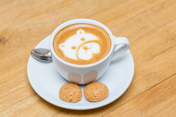 Espresso macchiato served with cookies