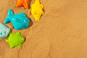 Fototapeta na wymiar Toys on beach
