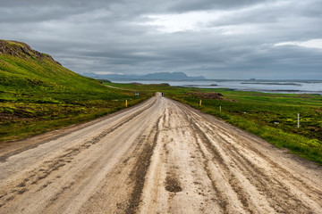 Fototapeta na wymiar Snaefellsnesvegur road 54 along in northern shore of Snaefellsnes peninsula of Vesturland region of Iceland.