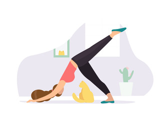 Downward-facing dog. Woman doing Yoga with cat