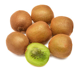 Ripe kiwi fruit whole and sliced isolated on white background. Flat lay, top view
