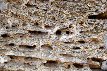 fragment of brown brick block wall
