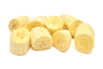 Banana slices isolated on white background. Flat lay, top view