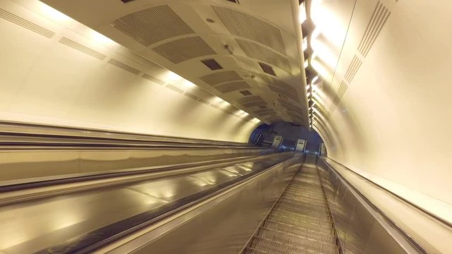 Going down the empty escalators in a subway