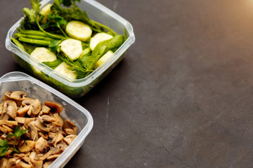 The food in the containers, a healthy diet, good nutrition concepts.