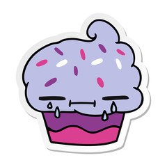 sticker cartoon of a crying cupcake