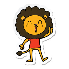 sticker of a laughing lion giving peace sign