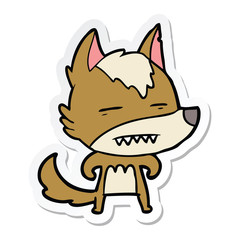sticker of a cartoon wolf showing teeth