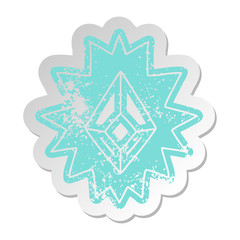 distressed old sticker of a red bright jewel