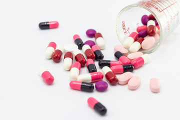 the pile of pills and capsules white background concept Health
