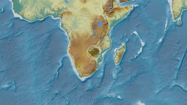 Zimbabwe area presented against the global relief map in the Patterson Cylindrical projection with animated oblique transformation