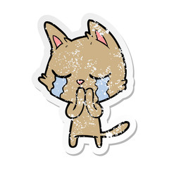 distressed sticker of a crying cartoon cat