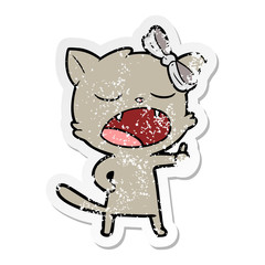 distressed sticker of a cartoon yawning cat