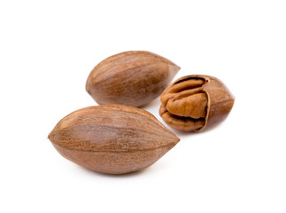 Fresh pecan nuts isolated on a white background