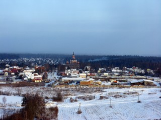 Fototapeta premium View of the village from the mountain, winter