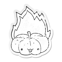 distressed sticker of a cartoon flaming pumpkin