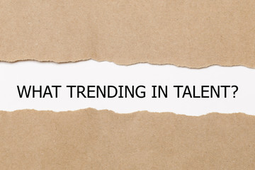WHAT TRENDING IN TALENT? question written under torn paper. - Image 