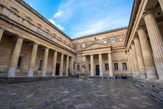 Lecce, Puglia, Italy - Public library and Principal facade of Convitto Palmieri with the bust of Giosue Carducci in Piazzetta Carducci square of Lecce. Apulia