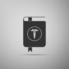 Medical book and Caduceus medical symbol icon isolated on grey background. Medical reference book, textbook, encyclopedia. Scientific literature. Flat design. Vector Illustration