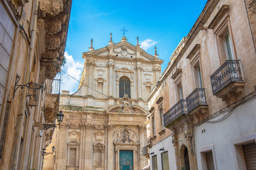 Fototapeta na wymiar LECCE, Puglia ,Italy - Facade of Ancient Baroque church Santa Irene in historical center in the old town. A region of Apulia.