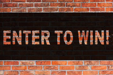 Text sign showing Enter To Win. Business photo showcasing Award Reward Prize given for visiting a website Chance Giveaway Brick Wall art like Graffiti motivational call written on the wall