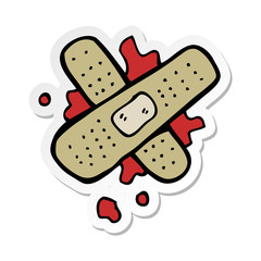 sticker of a cartoon bloody medical plaster