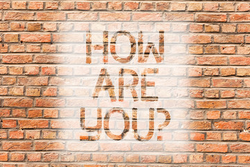 Text sign showing How Are Youquestion. Business photo text Your Health status Asking about your life and health Brick Wall art like Graffiti motivational call written on the wall