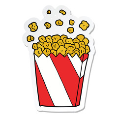 sticker of a cartoon cinema popcorn