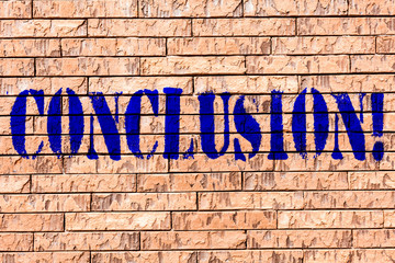 Obraz premium Handwriting text Conclusion. Conceptual photo Results analysis Final decision End of an event or process Brick Wall art like Graffiti motivational call written on the wall