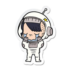 sticker of a cartoon crying astronaut girl
