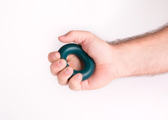 Obraz premium Round rubber expander for sports. Hand Expander.