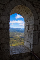 Ancient window looking to the mountains.