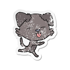 distressed sticker of a cartoon dog sticking out tongue